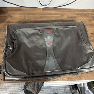 Tumi Gray Luggage with Rectangular Shape and Soft Fabric